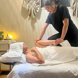 Hot stone and hot oil Thai massage treatment